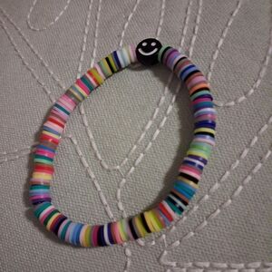 Multicolor Clay Bead Bracelet with Smiley Charm